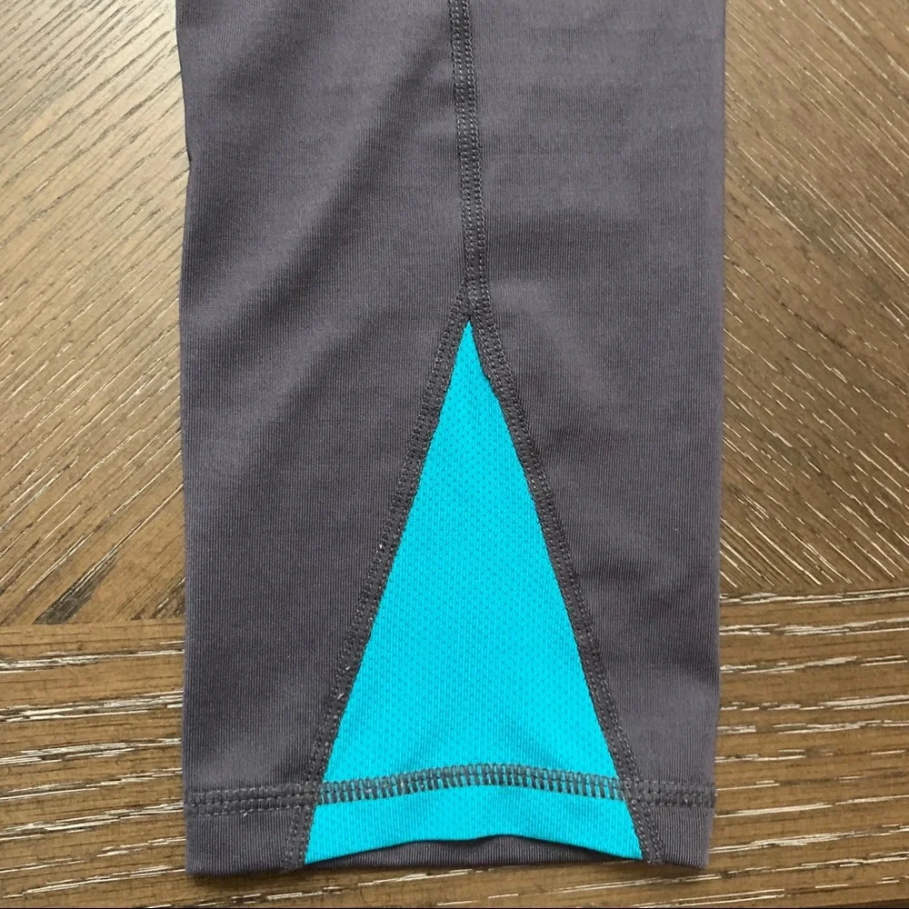 Head gray athletic pants turquoise on back legs Size XS